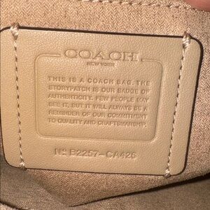 Coach Kleo Backpack in signature canvas with a white flap